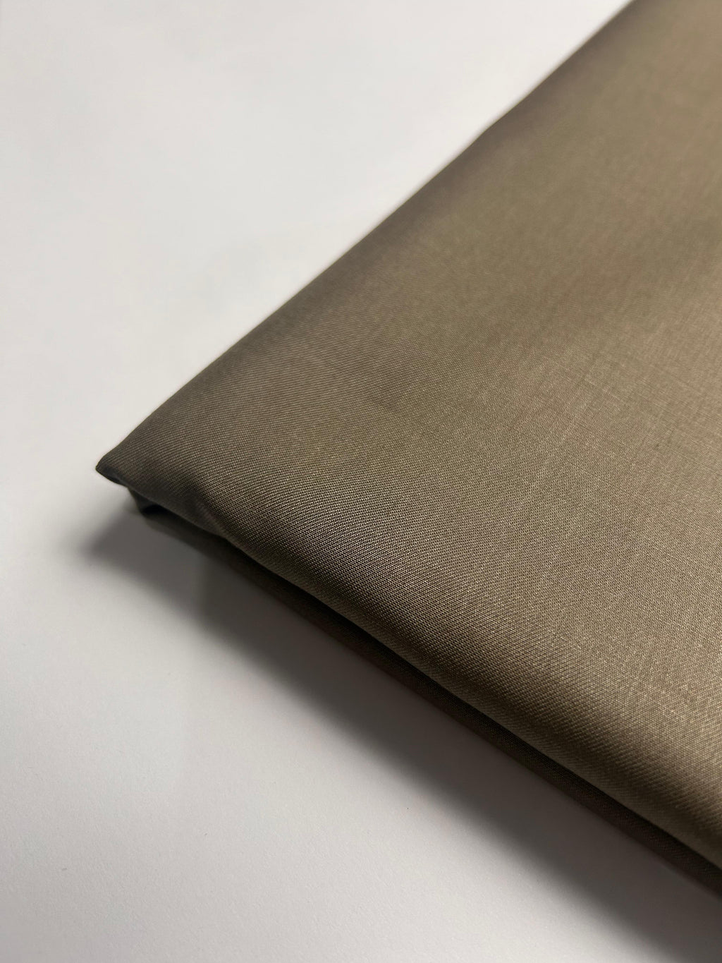 Naavar Official brown unstitched shalwar kameez – premium Pakistani menswear with timeless appeal.