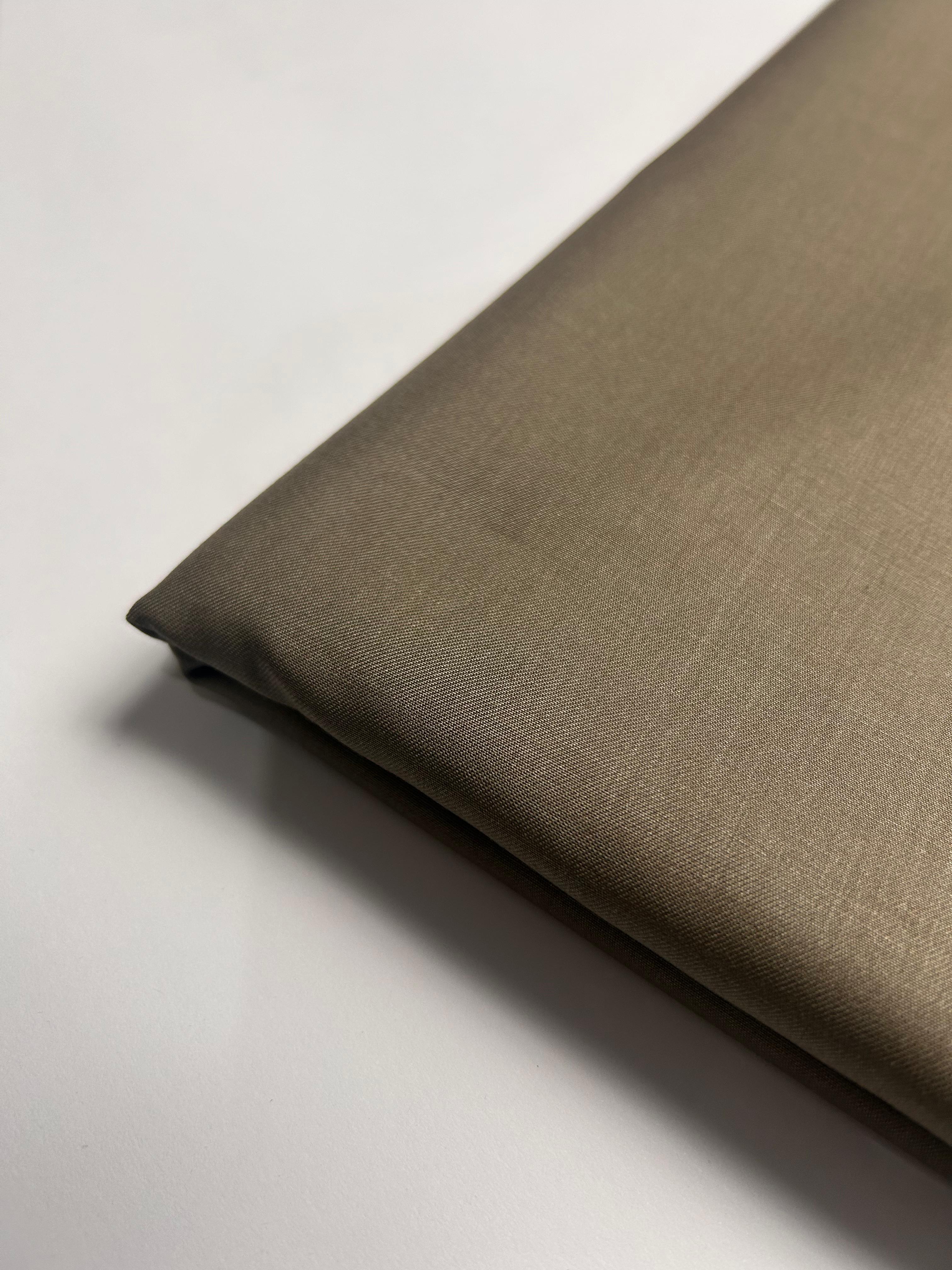 Naavar Official brown unstitched shalwar kameez – premium Pakistani menswear with timeless appeal.